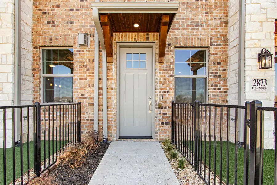 Exterior details and patio area of a home in The Tribute, The Colony (Image 3). Exterior details and patio area of a home in The Tribute, The Colony (Image 3).