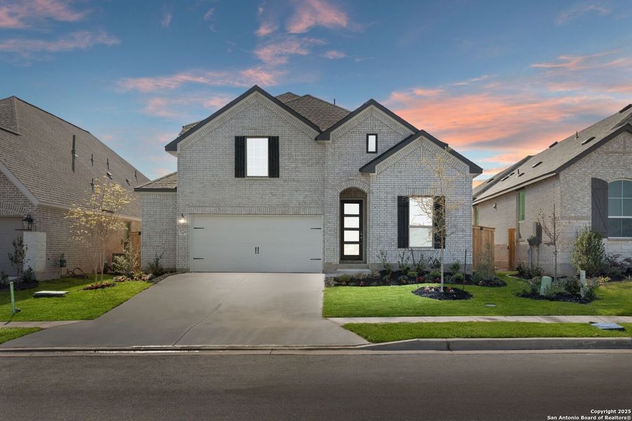 Front exterior of a new home in Mayfair, New Braunfels, TX, highlighting curb appeal (Image 16).
