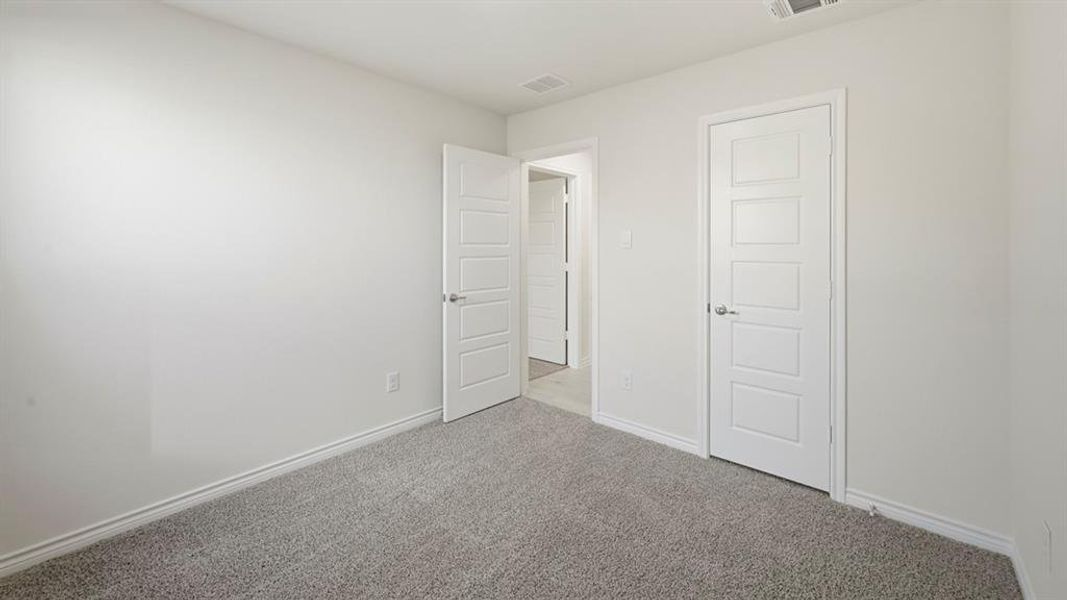 Spacious, unfurnished interior of a new home in Winchester Crossing, Princeton (Image 17).