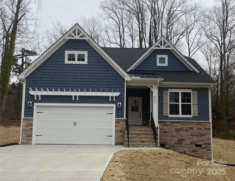 Front exterior of a new home in , Hickory, NC, highlighting curb appeal (Image 11).