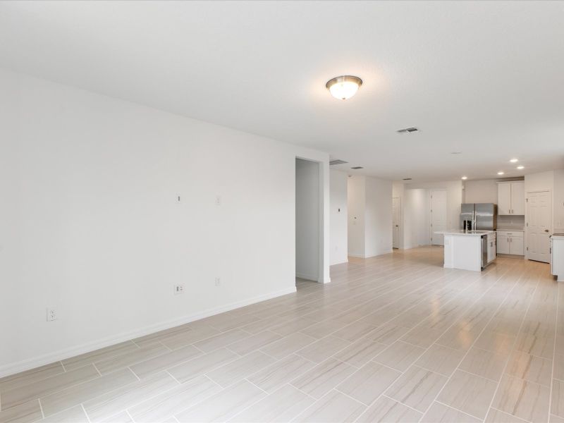 Great room in the Daphne floorplan at 2386 White Tail Street