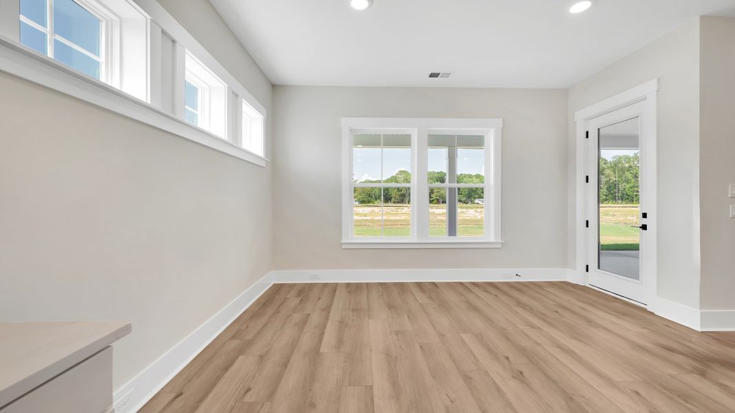 Representative furnished interior of a home built from the Haven by DRB Elevate. in Summerwind Crossing at Lakes of Cane Bay, Summerville (Image 9). Representative furnished interior of a home built from the Haven by DRB Elevate. in Summerwind Crossing at Lakes of Cane Bay, Summerville (Image 9).