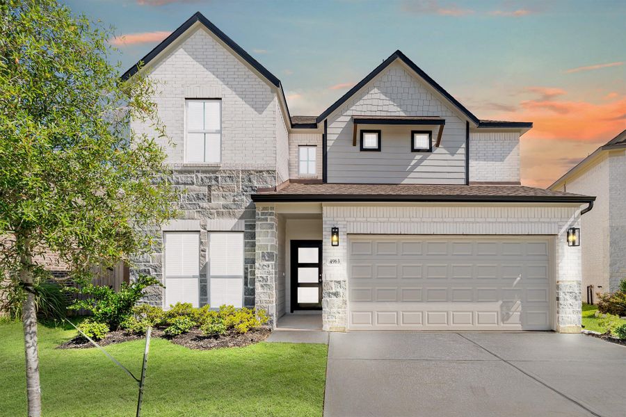 Front exterior of a new home in Grand Oaks – The Cove, Houston, TX, highlighting curb appeal (Image 16). Front exterior of a new home in Grand Oaks – The Cove, Houston, TX, highlighting curb appeal (Image 16).