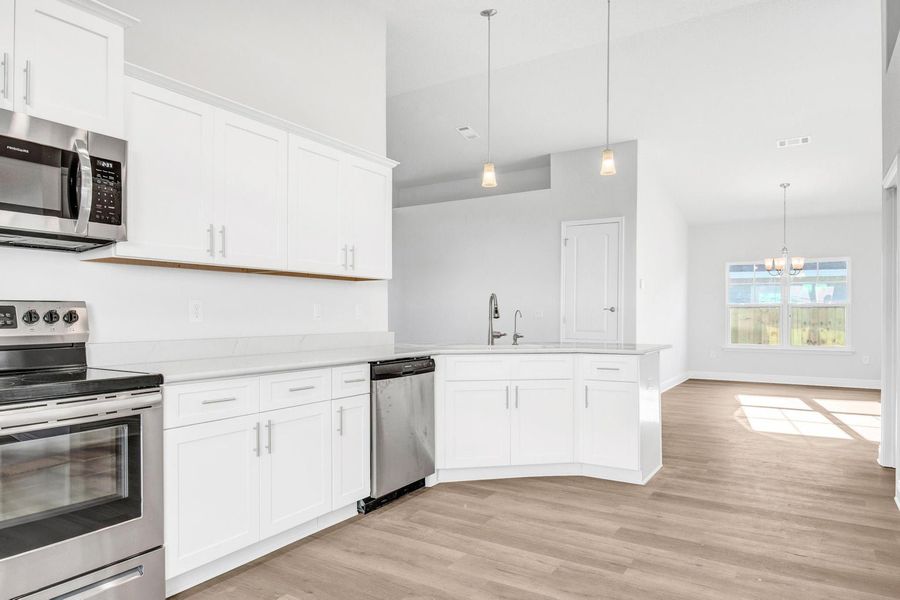 Furnished interior view inside a new home in The Bluffs at Lafayette, Freeport (Image 6).
