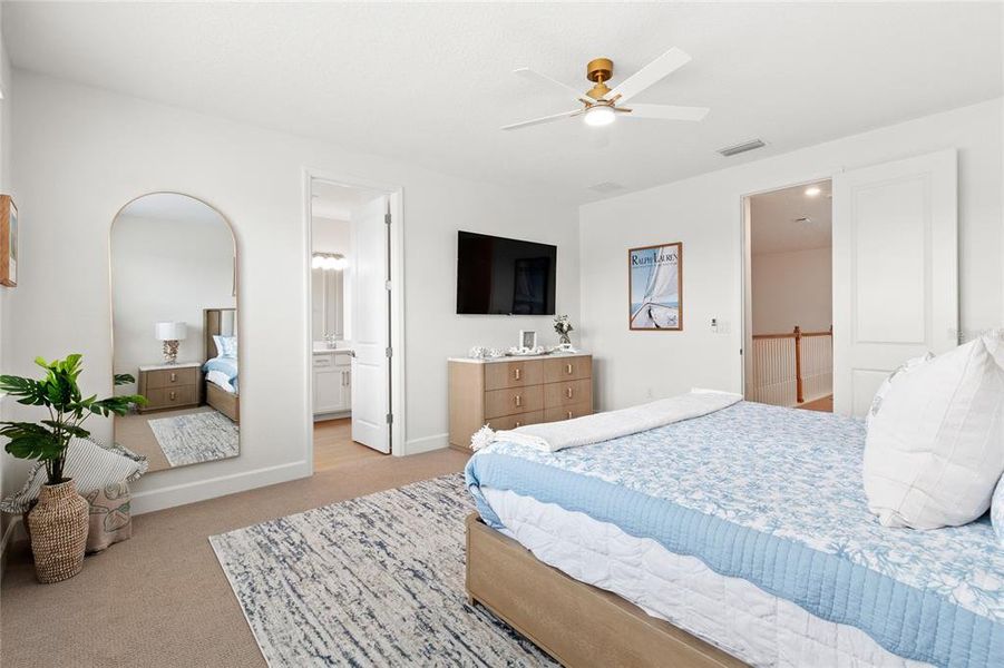Furnished interior view inside a new home in Harvest at Ovation, Winter Garden (Image 32).