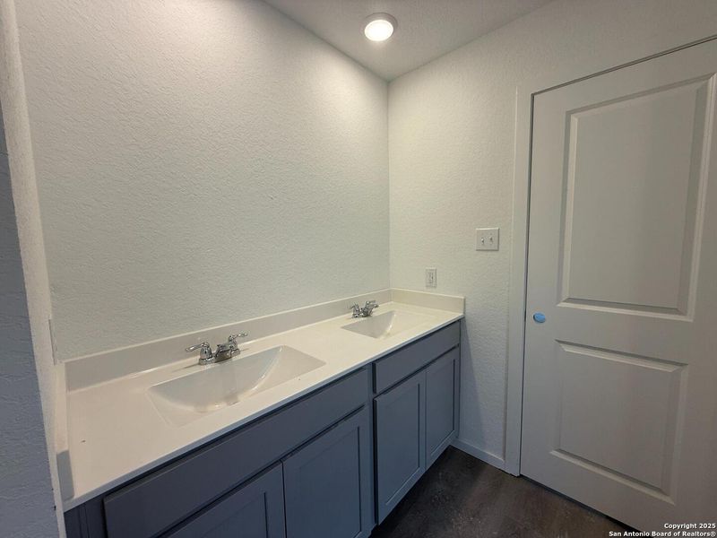 Furnished interior view inside a new home in Meadows at Hennersby Hollow 40's, San Antonio (Image 10).