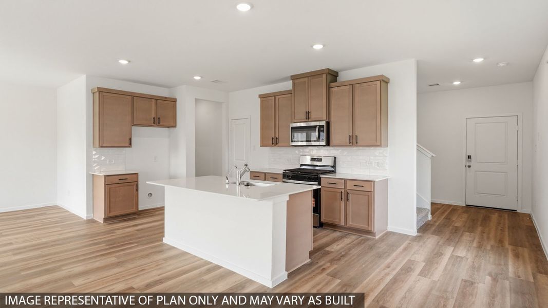 Furnished interior view inside a new home in Sunterra, Katy (Image 7).