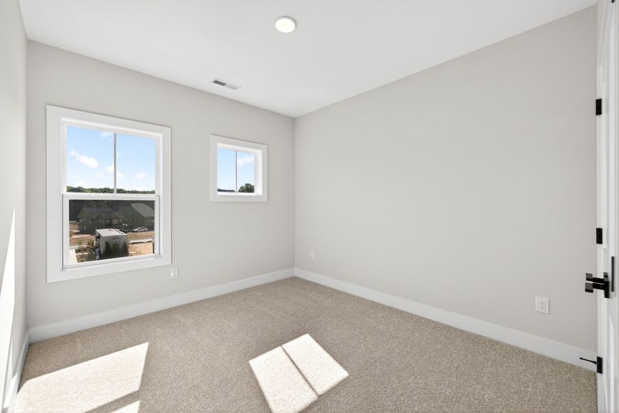 Representative unfurnished interior of a home built from the Atlas Interior Unit by Baker Residential in Atwater Station - Midtown Collection, Fuquay Varina (Image 48).