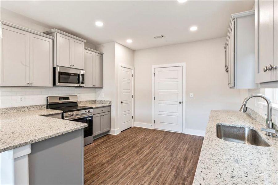 Furnished interior view inside a new home in , Hampton (Image 5).