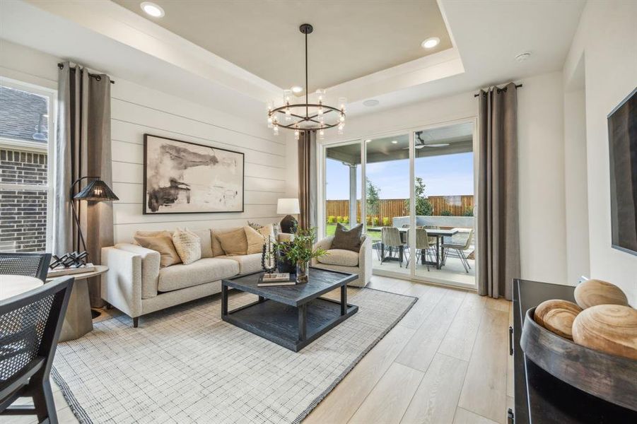 *Model Representation - Spacious gathering room with large windows