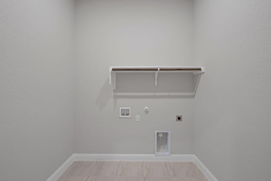 Laundry room featuring hookup for a gas dryer, electric dryer hookup, and washer hookup