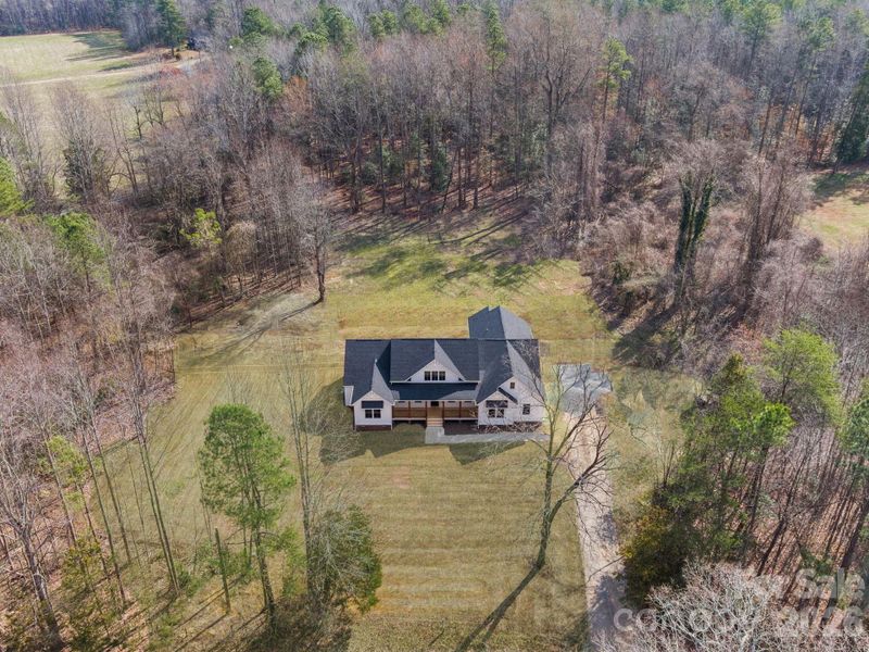 Front exterior of a new home in , Asheboro, NC, highlighting curb appeal (Image 13).
