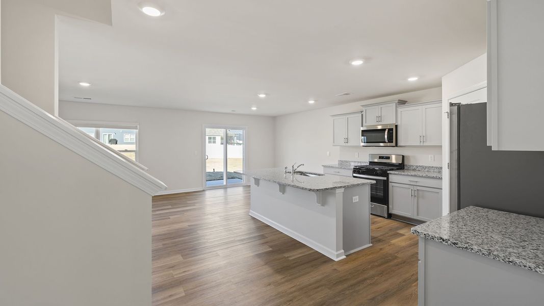 Furnished interior view inside a new home in Bentley Park, Greenwood (Image 6).