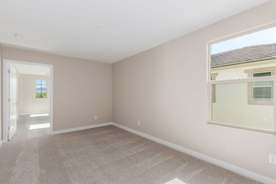 Spacious, unfurnished interior of a new home in Solvida at Estrella, Goodyear (Image 26).