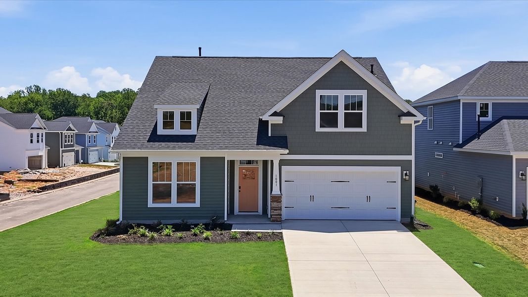Eye-catching exterior with timeless color palette and superior architectural detail Eye-catching exterior with timeless color palette and superior architectural detail
