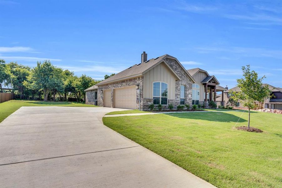 Front exterior of a new home in , Red Oak, TX, highlighting curb appeal (Image 19). Front exterior of a new home in , Red Oak, TX, highlighting curb appeal (Image 19).
