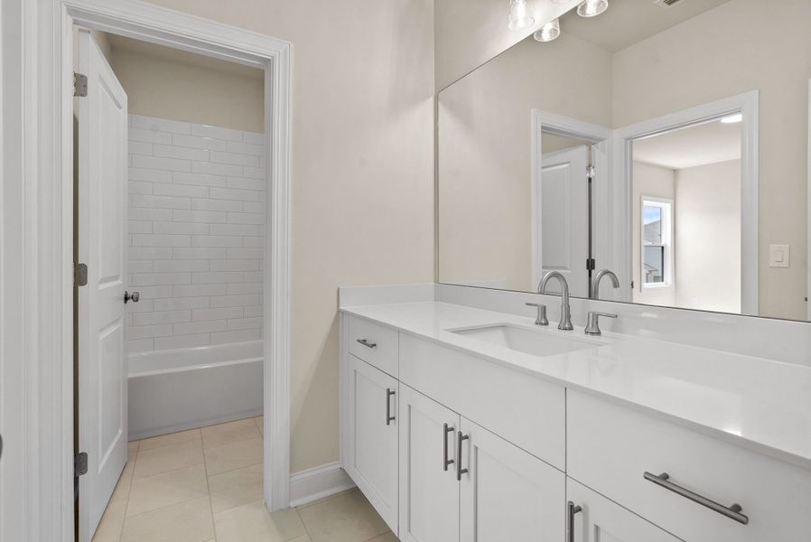 Representative furnished interior of a home built from the The Blaylock by The Providence Group in Promenade at Sawnee Village, Cumming (Image 8).