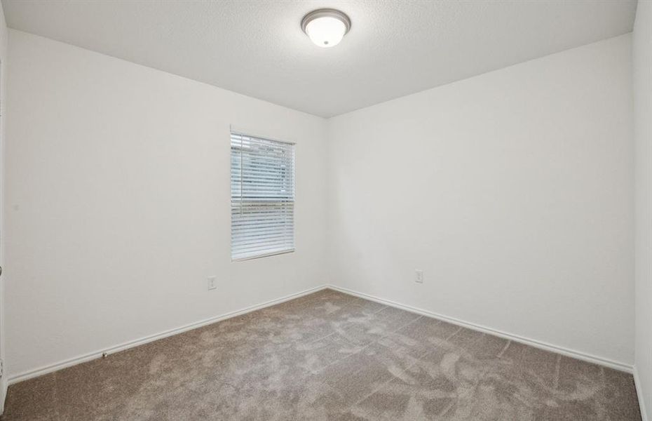 Inviting bedroom offering soft natural light Inviting bedroom offering soft natural light