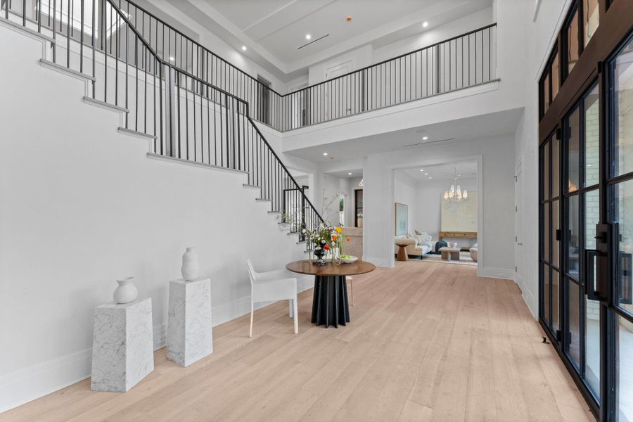 Additional view of the formal entry, seamlessly flowing toward the study and bar. Additional view of the formal entry, seamlessly flowing toward the study and bar.