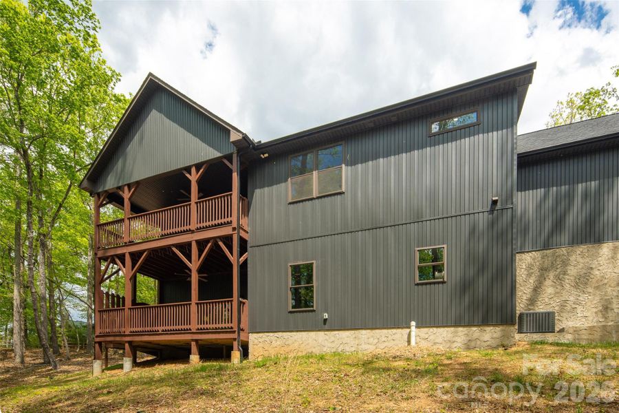 Exterior details and patio area of a home in , Purlear (Image 24).