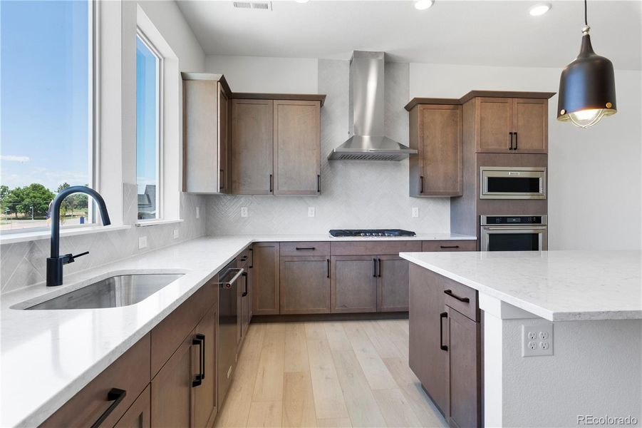 Furnished interior view inside a new home in Dillon Pointe - Skyview, Broomfield (Image 10).