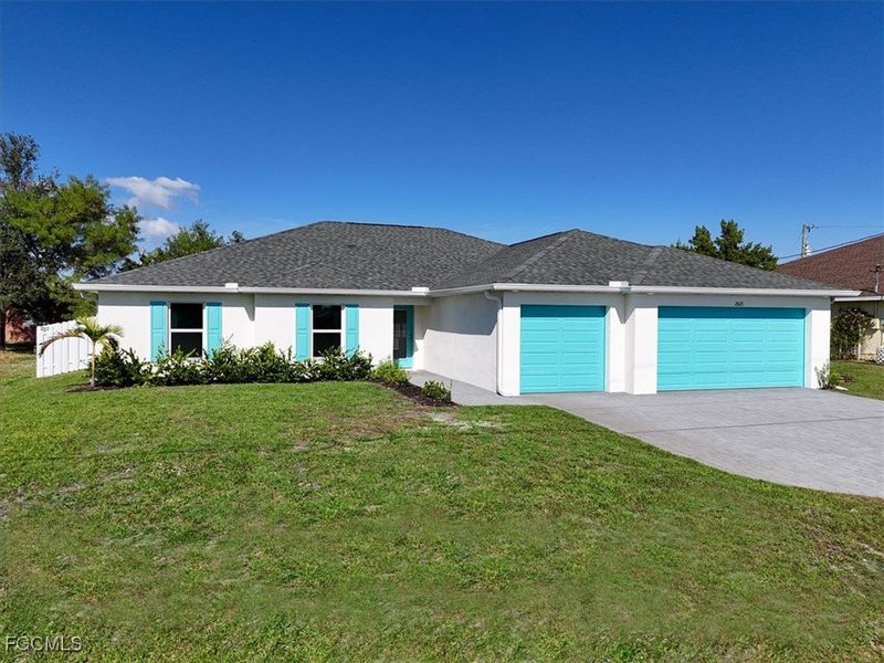 Front exterior of a new home in Cape Coral, Cape Coral, FL, highlighting curb appeal (Image 25).