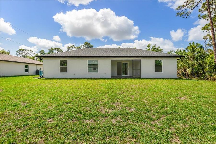 Exterior details and patio area of a home in , Port Charlotte (Image 18).