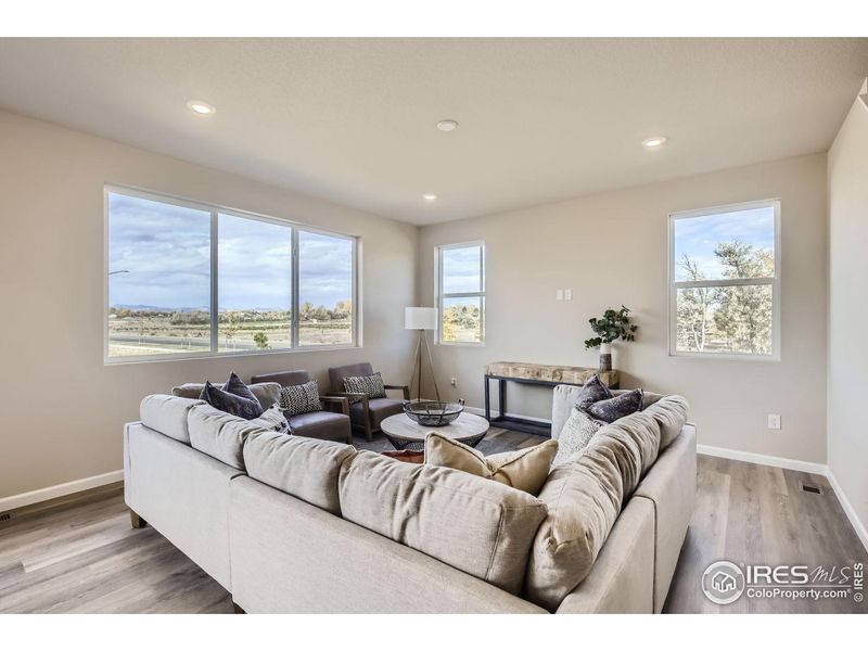 Great room *Photo not of actual home, but same floorplan and style*