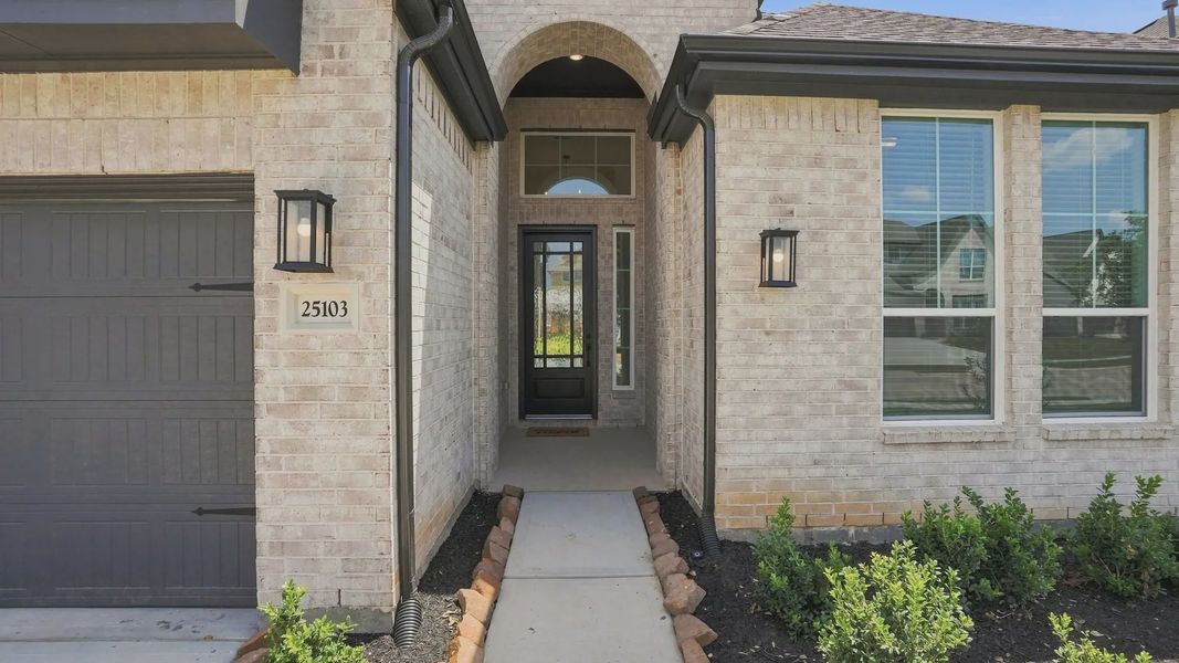 Exterior details and patio area of a home in Elyson 50's, Katy (Image 3).