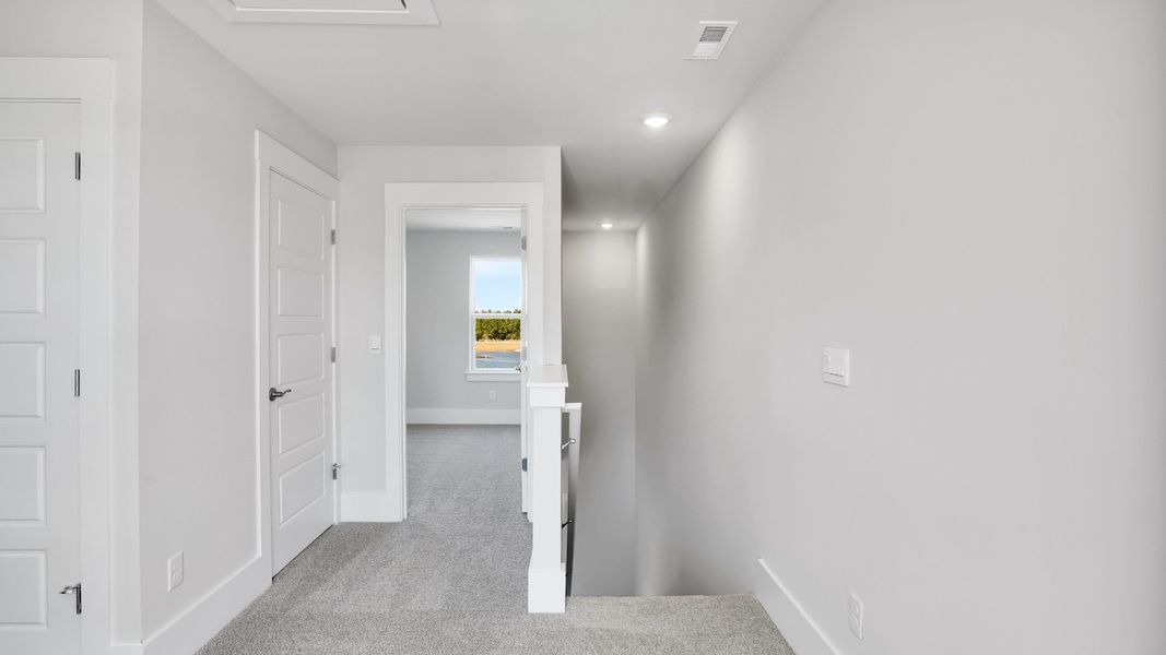 Spacious, unfurnished interior of a new home in The Pines at Blake Farm, Wilmington (Image 17).