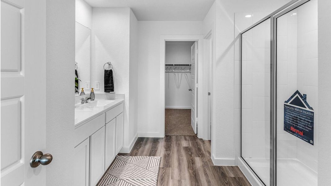 Representative photo. The second floor is designed for comfort and flexibility, highlighted by a spacious primary suite with a well-appointed bath that includes a separate shower and tub. Two additional bedrooms easily accommodate guests, while a central flex space creates endless possibilities for a game room, second living area, or personalized retreat. Representative photo. The second floor is designed for comfort and flexibility, highlighted by a spacious primary suite with a well-appointed bath that includes a separate shower and tub. Two additional bedrooms easily accommodate guests, while a central flex space creates endless possibilities for a game room, second living area, or personalized retreat.