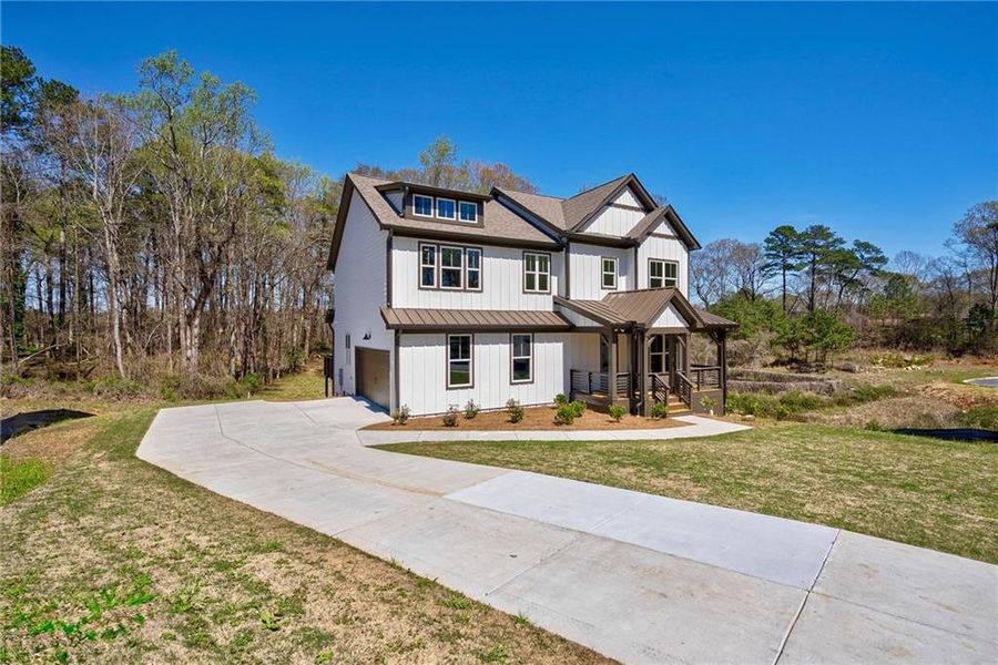 Front exterior of a new home in , Atlanta, GA, highlighting curb appeal (Image 31).