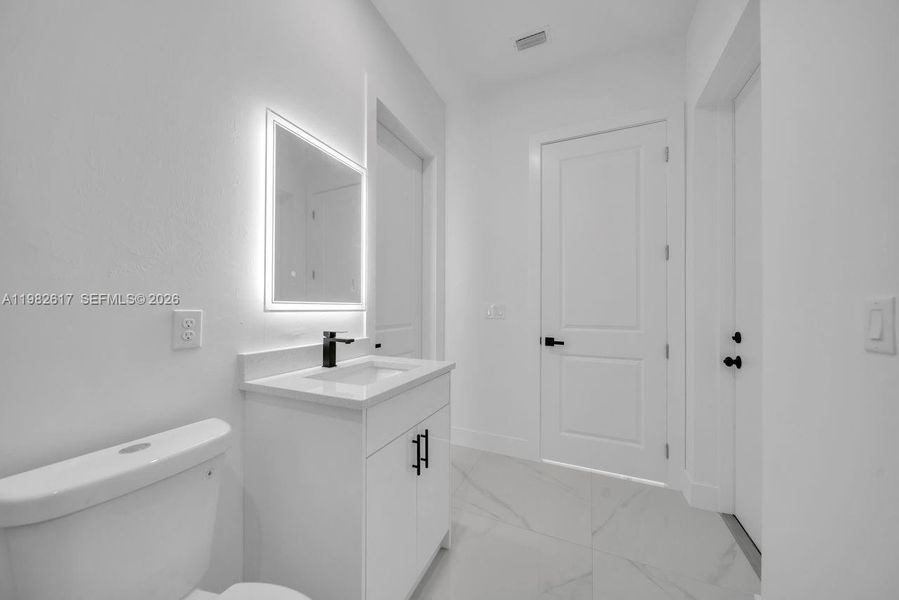 Furnished interior view inside a new home in , Lehigh Acres (Image 9).