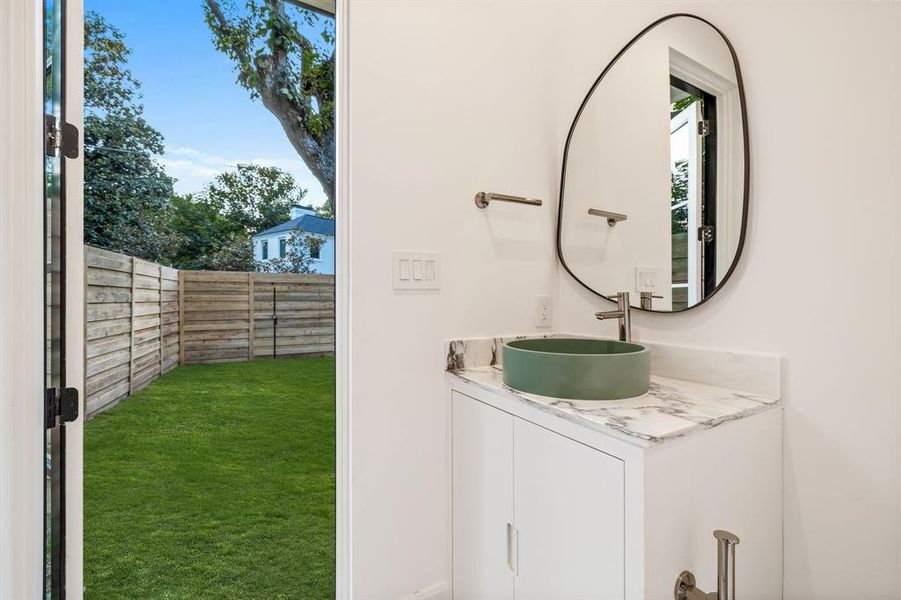 pool/outdoor bath with plenty of natural light and vanity