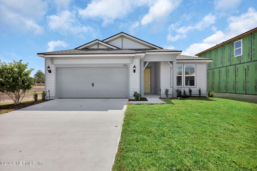 Front exterior of a new home in Hyland Trail, Green Cove Springs, FL, highlighting curb appeal (Image 25). Front exterior of a new home in Hyland Trail, Green Cove Springs, FL, highlighting curb appeal (Image 25).