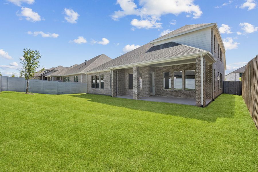 Exterior details and patio area of a home in Painted Tree Lakeside, McKinney (Image 4).
