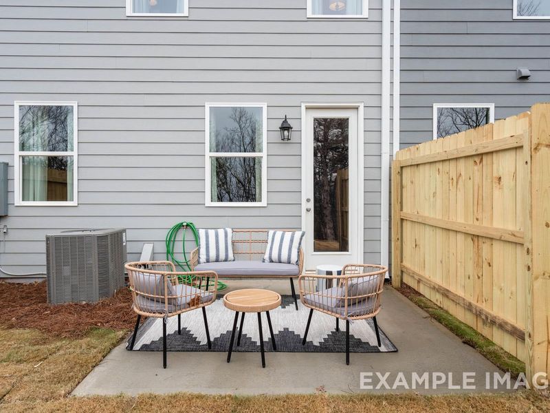 Exterior details and patio area of a home in Townes at North Main, Lillington (Image 24).