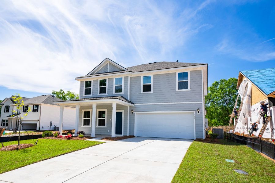 Front exterior of a new home in Monroe Preserve, Chapin, SC, highlighting curb appeal (Image 22).