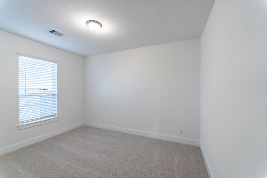Spacious, unfurnished interior of a new home in Sunterra, Katy (Image 16).