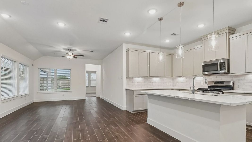 Furnished interior view inside a new home in Meridiana Townhomes, Manvel (Image 11).
