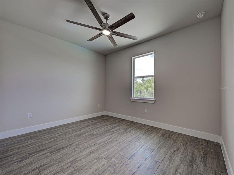 Spacious, unfurnished interior of a new home in , Port Charlotte (Image 37).