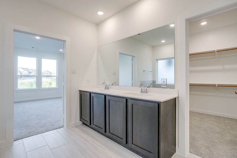 Furnished interior in a model home at Bear Ridge in Burleson (Image 6).