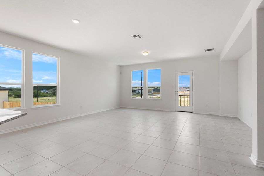 Spacious, unfurnished interior of a new home in Hidden Bluffs at TRP, San Antonio (Image 4).