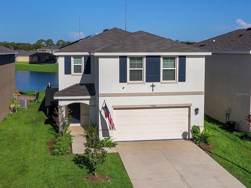 Front exterior of a new home in , Bradenton, FL, highlighting curb appeal (Image 23).