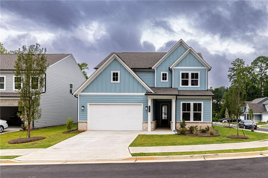 Front exterior of a new home in Enclave at Edgewater, Canton, GA, highlighting curb appeal (Image 27).