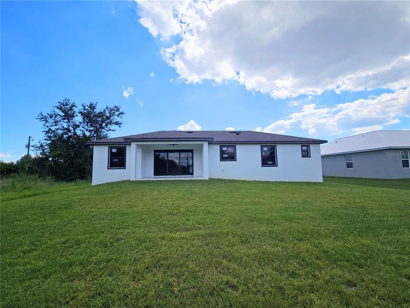 Exterior details and patio area of a home in , Port Charlotte (Image 3).