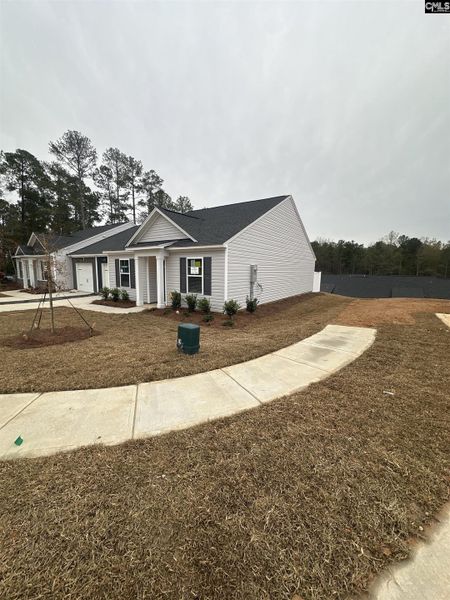 Exterior details and patio area of a home in Piney Woods Bluff, Columbia (Image 4).
