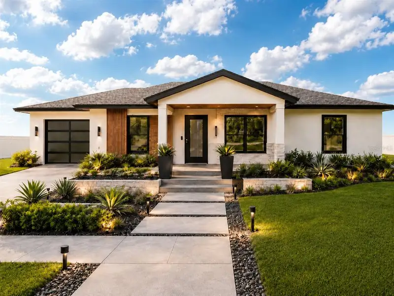 Front exterior of a new home in , Ocala, FL, highlighting curb appeal (Image 19). Front exterior of a new home in , Ocala, FL, highlighting curb appeal (Image 19).