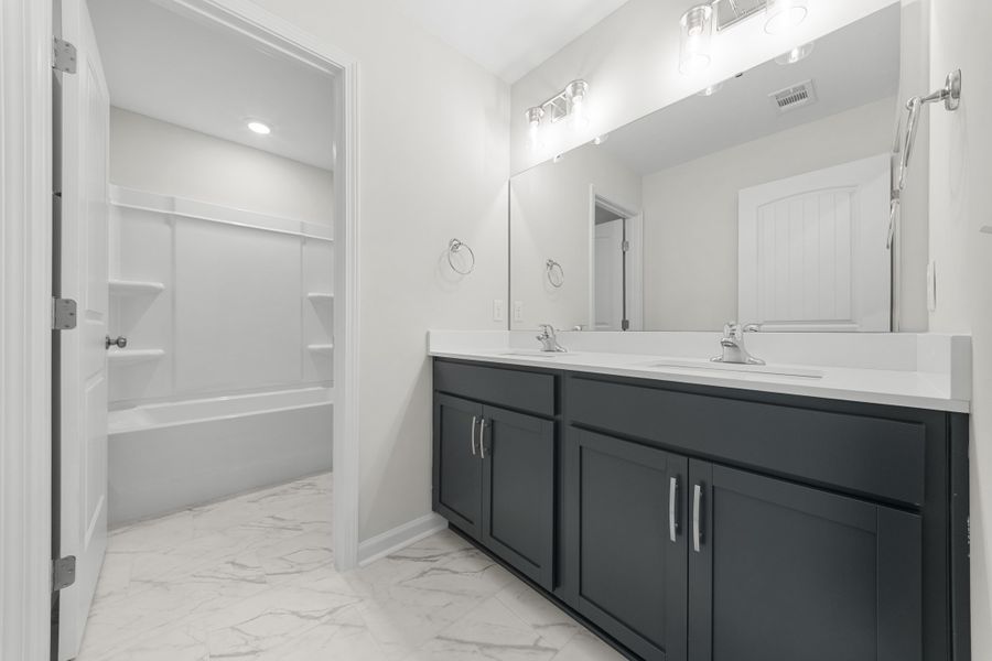 Representative furnished interior of a home built from the The Madison by Smith Family Homes in Camden Crossing, Savannah (Image 12).