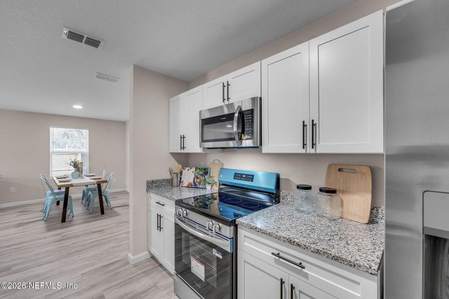 Furnished interior view inside a new home in , Jacksonville (Image 26).